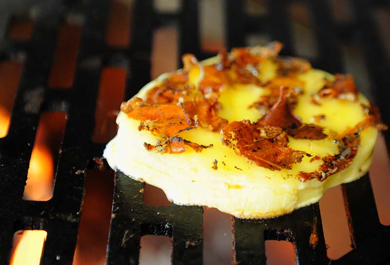 Provolone grilling on the Kalamazoo Aregentinian Gaucho Grill