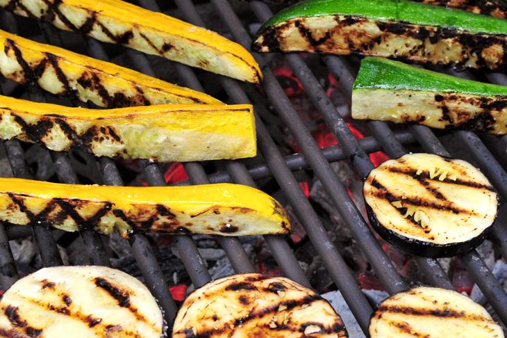 Ratatouille on a hybrid fire grill cooking with gas and charcoal