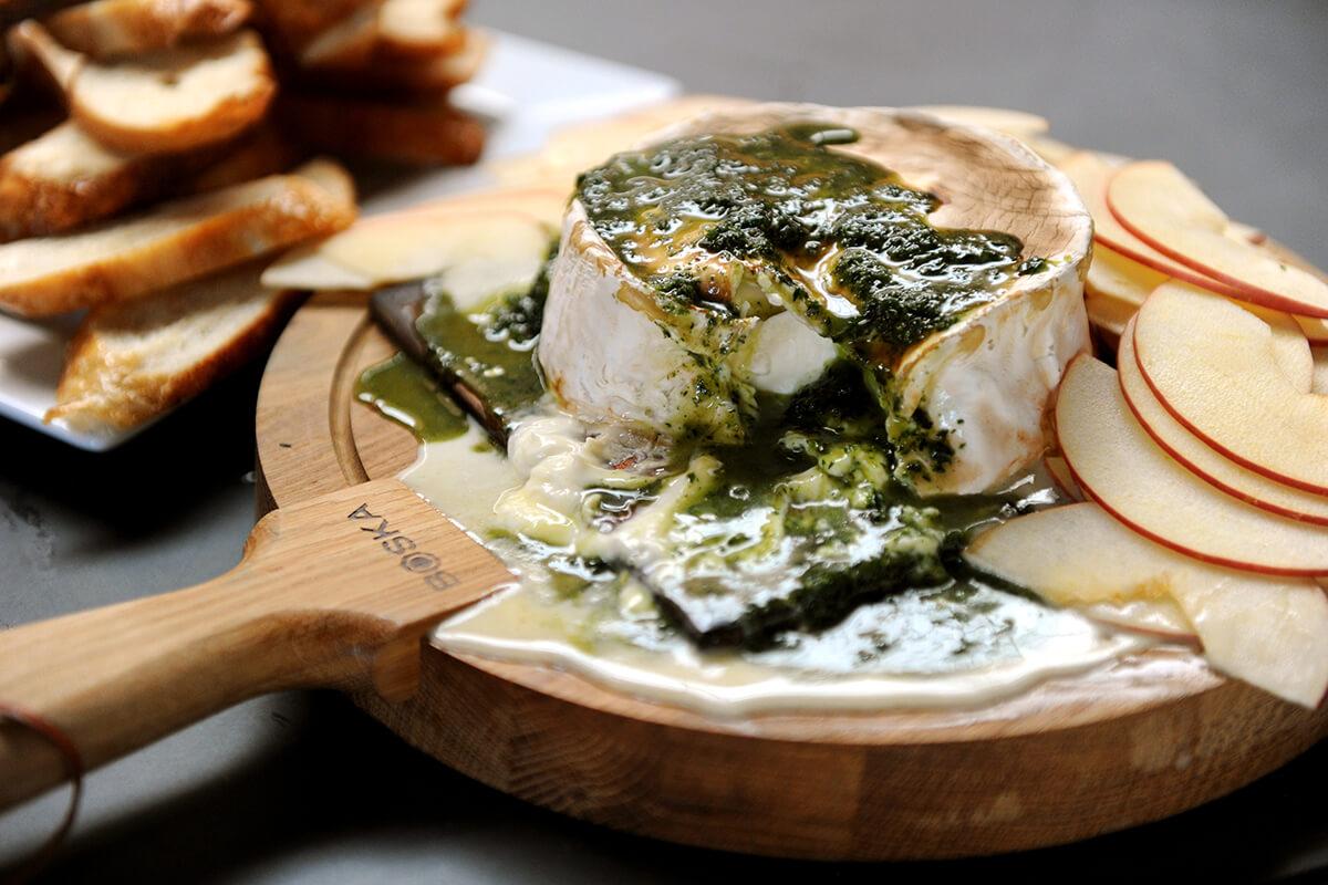 Image of Cedar-Planked Brie Crostini with Apples and Thyme Honey Sauce