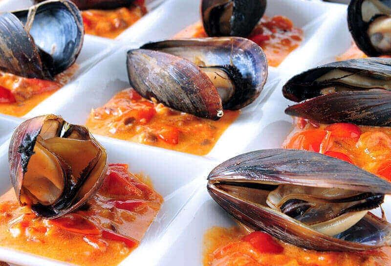 Image of Wood-Fired Mussels with Rustic Olive and Tomato Sauce