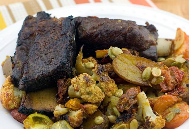 Image of Beer-Braised Short Ribs with Roasted Cauliflower, Potatoes and Pumpkin Seeds