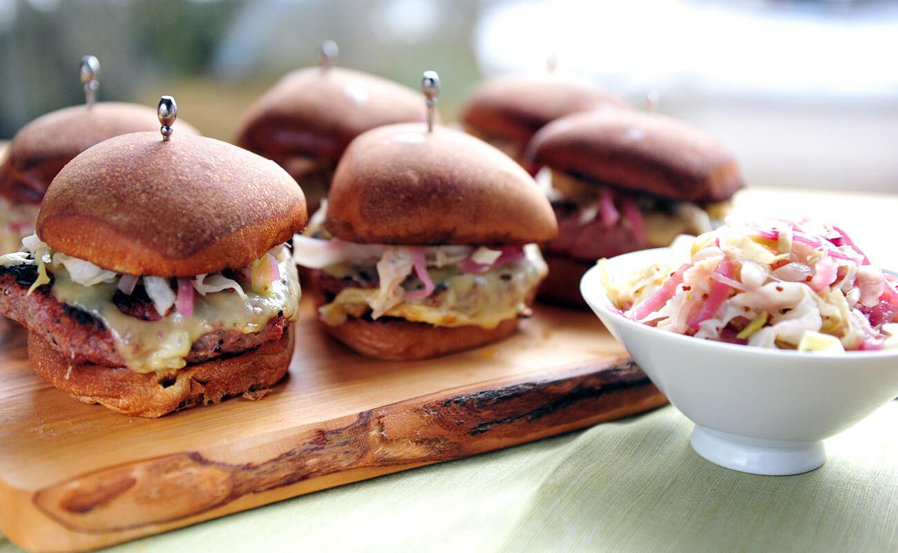 Image of Corned Beef Burgers with Wilted Cabbage Slaw
