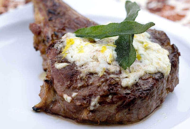 Image of Pasture-Raised Veal Chops with Garlic Herb Cheese Butter and Fried Sage Leaves