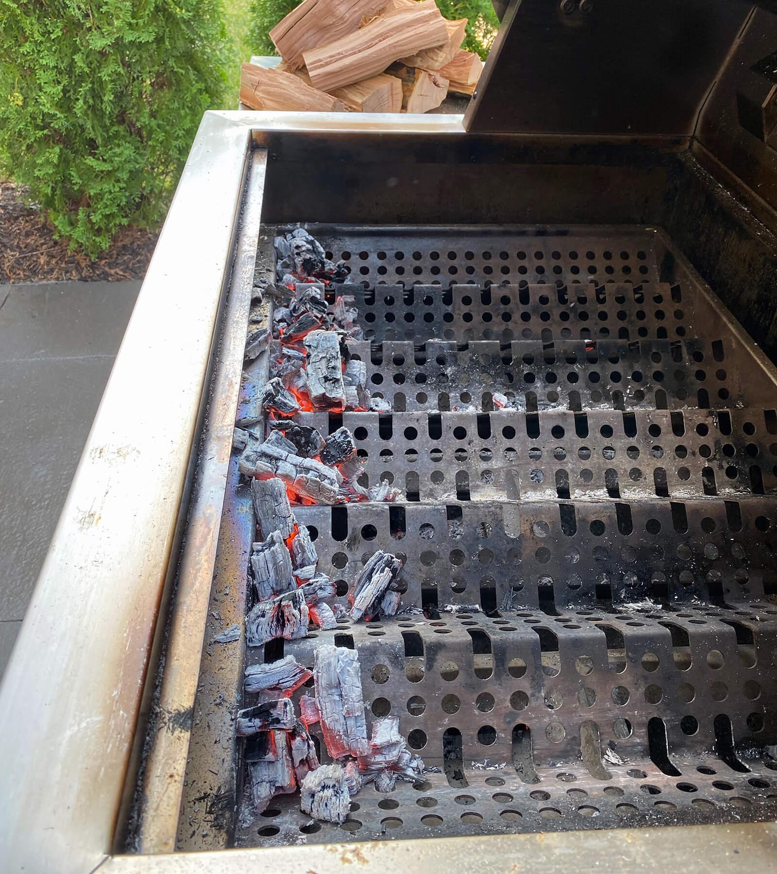 hot charcoal under grill surface