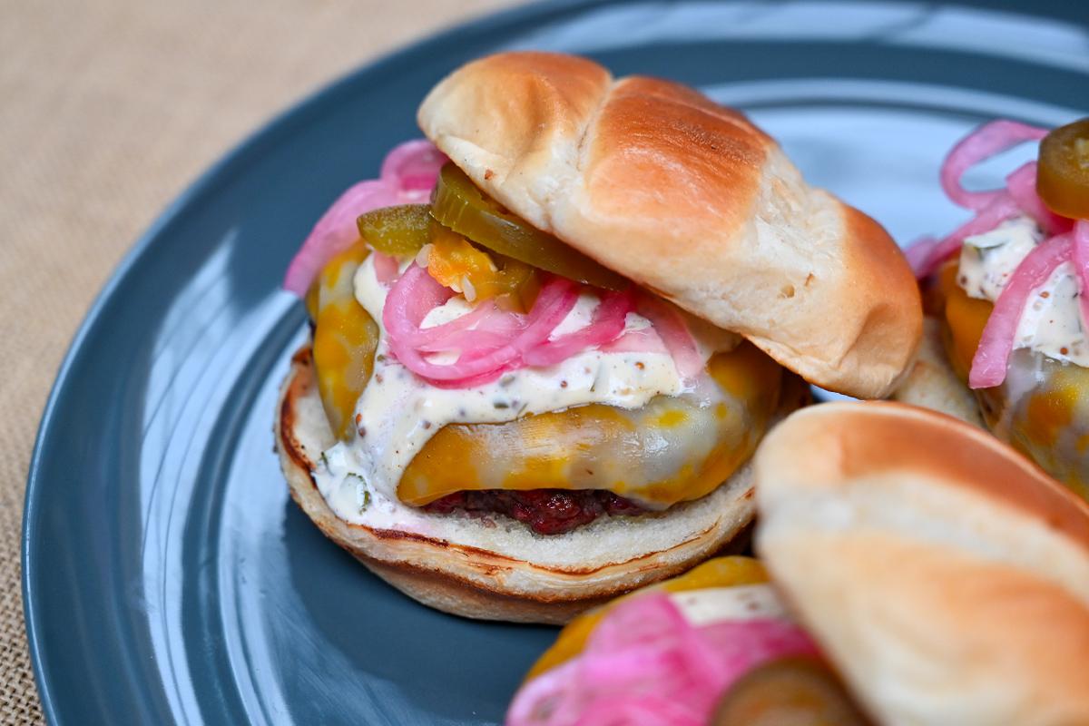 Image of Smoked Brisket Burgers with Colby Jack, Whole Grain Jalapeno Dijonnaise and Pickled Onions