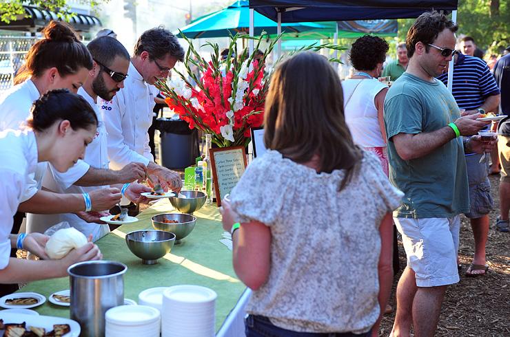 Serving up delicious corn cakes off the grill at Green City Market