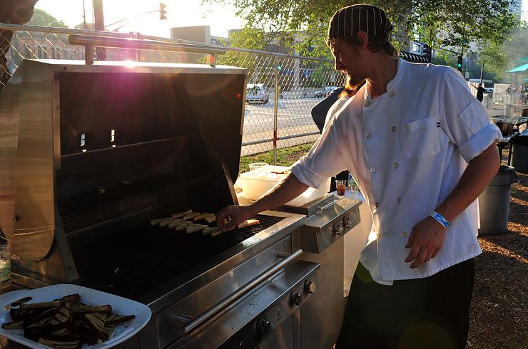 Brian from Frontera Grill grilling corn cakes on the Kalamazoo
